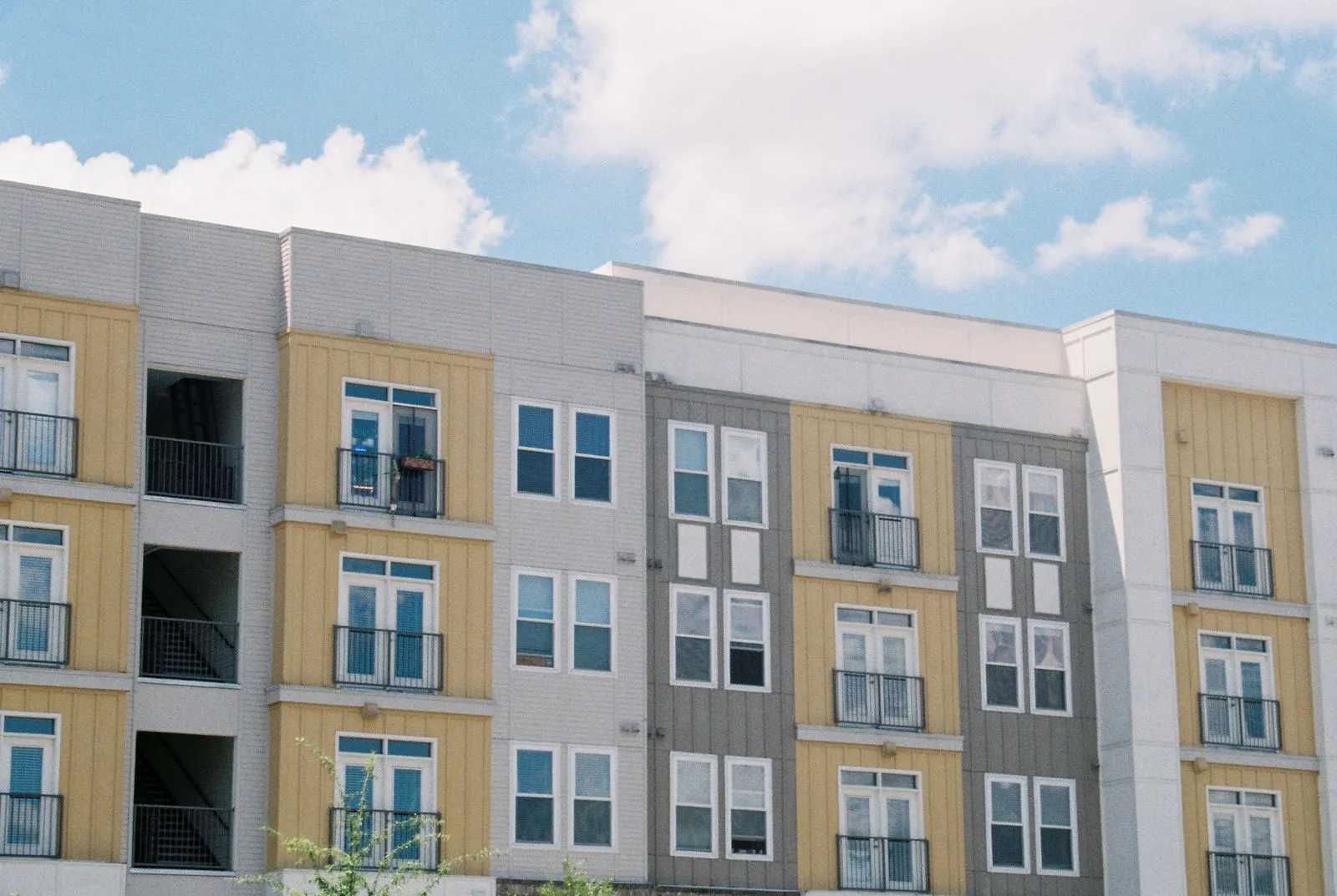 Multi-story apartment building, an example of the kind of housing that participates in local rental-assistance programs